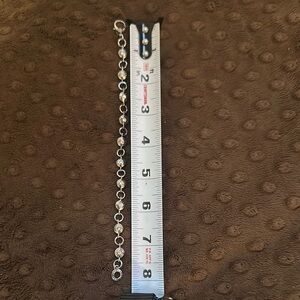 Henri Bendel Silver Tone Iconic Bracelet with Crystal Details